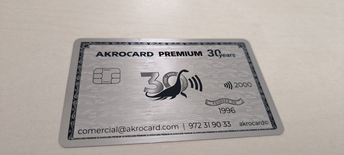 Photo of a silver Akrocard Premium metal card with laser engraving