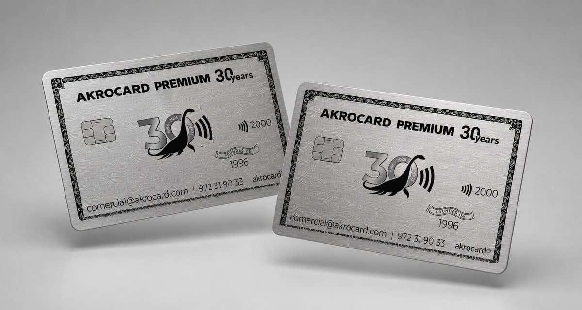 Two silver Akrocard Premium metal cards with laser engraving