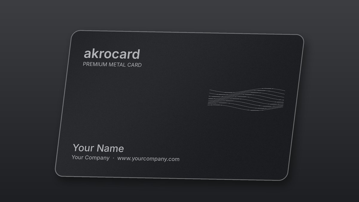 Black metal business card with matte finish and laser engraving